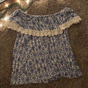 blue and white off the shoulders floral shirt